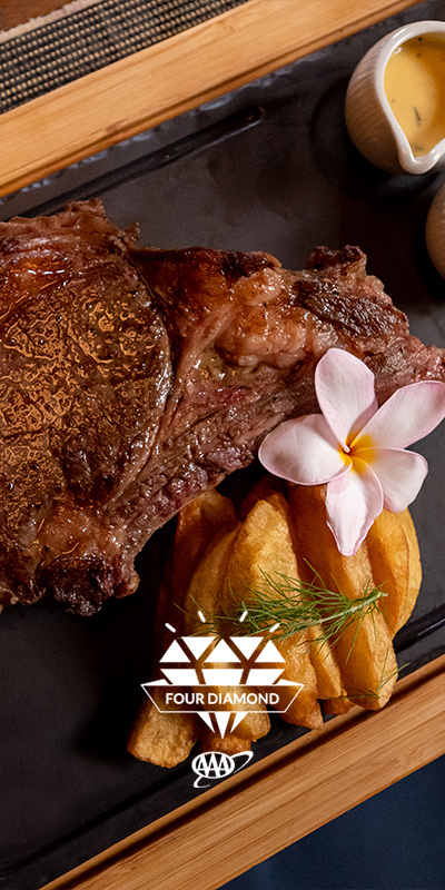  Delicioso plato de carne con patatas del restaurante El Asador de Lopesan Costa Bávaro Resort, Spa & Casino en en Punta Cana, República Dominicana 